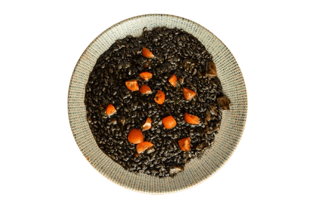 Black risotto with cuttlefish and fresh tomatoes
